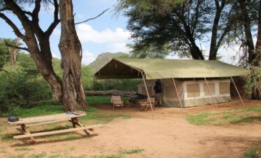 3 Days in Samburu: An Unforgettable Family Safari Adventure showing a luxury tented camp and outdoor picnic table