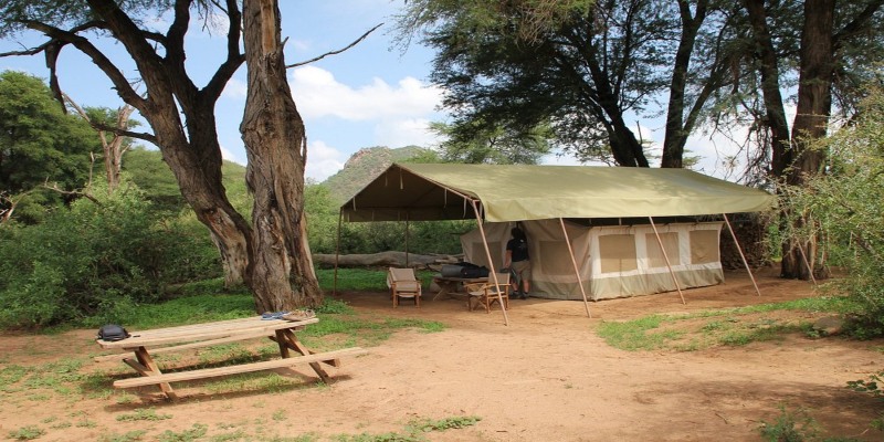 3 Days in Samburu: An Unforgettable Family Safari Adventure showing a luxury tented camp and outdoor picnic table